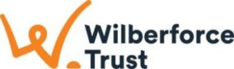 Wilberforce Trust logo has an image of a person’s head and arms on the left drawn in orange which also looks like the letter “W”. On the right hand side is “Wilberforce Trust”.