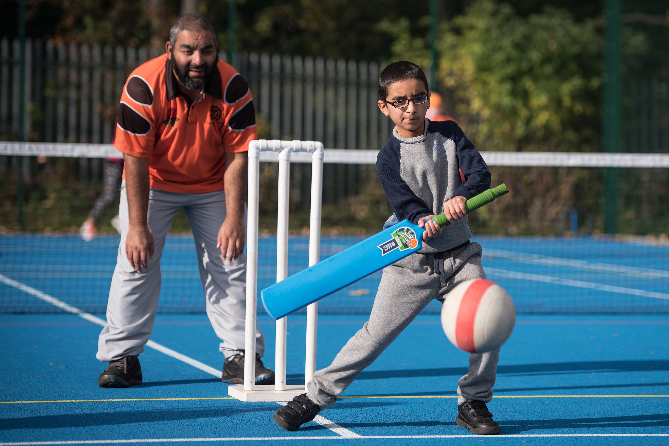 A boy taking part in cricket at a British Blind Sport Have a Go Day.