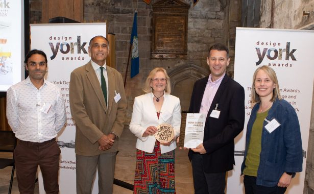 Winning team from William Birch & Sons Ltd, Wilberforce Trust and KS Architects holding York Design Awards 2023 trophy and certificate.