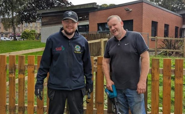 John and Kyle building a fence for FVSC’s guide dog run.