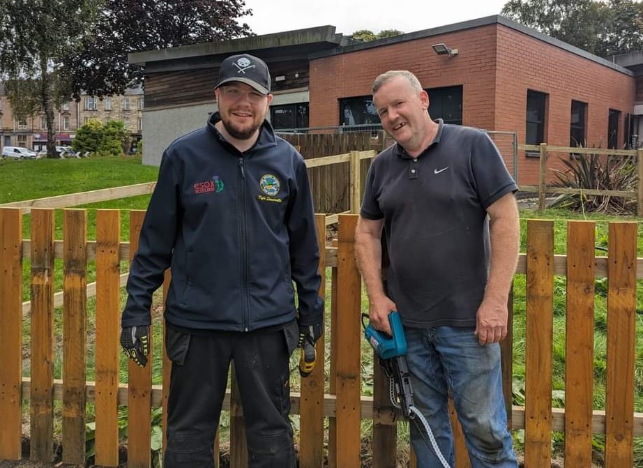 John and Kyle building a fence for FVSC’s guide dog run.