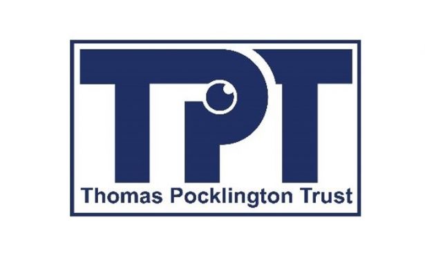 Thomas Pocklington Trust logo. Large TPT letters with the words Thomas Pocklington Trust underneath enclosed in a rectangle. Letters, words and the rectangle border are a dark blue. Within the P of TPT is a small round eye looking upwards.