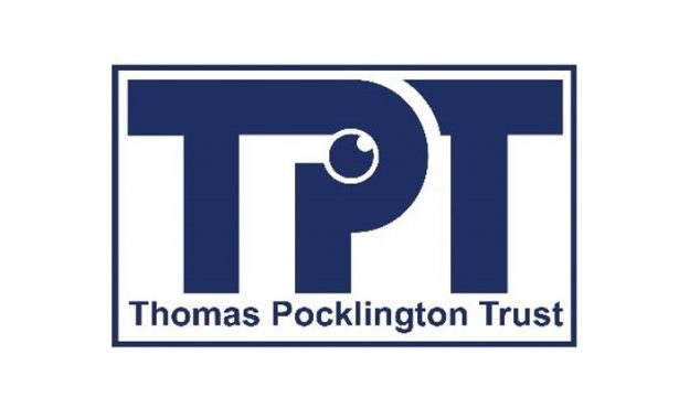 Thomas Pocklington Trust logo. Large TPT letters with the words Thomas Pocklington Trust underneath enclosed in a rectangle. Letters, words and the rectangle border are a dark blue. Within the P of TPT is a small round eye looking upwards.