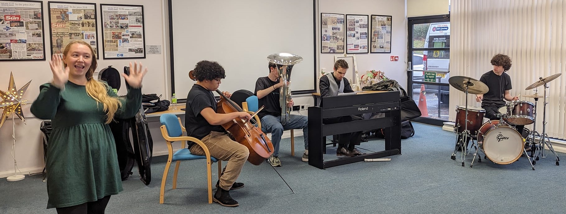 Quartet from Royal Conservatoire of Scotland with a person signing beside them.