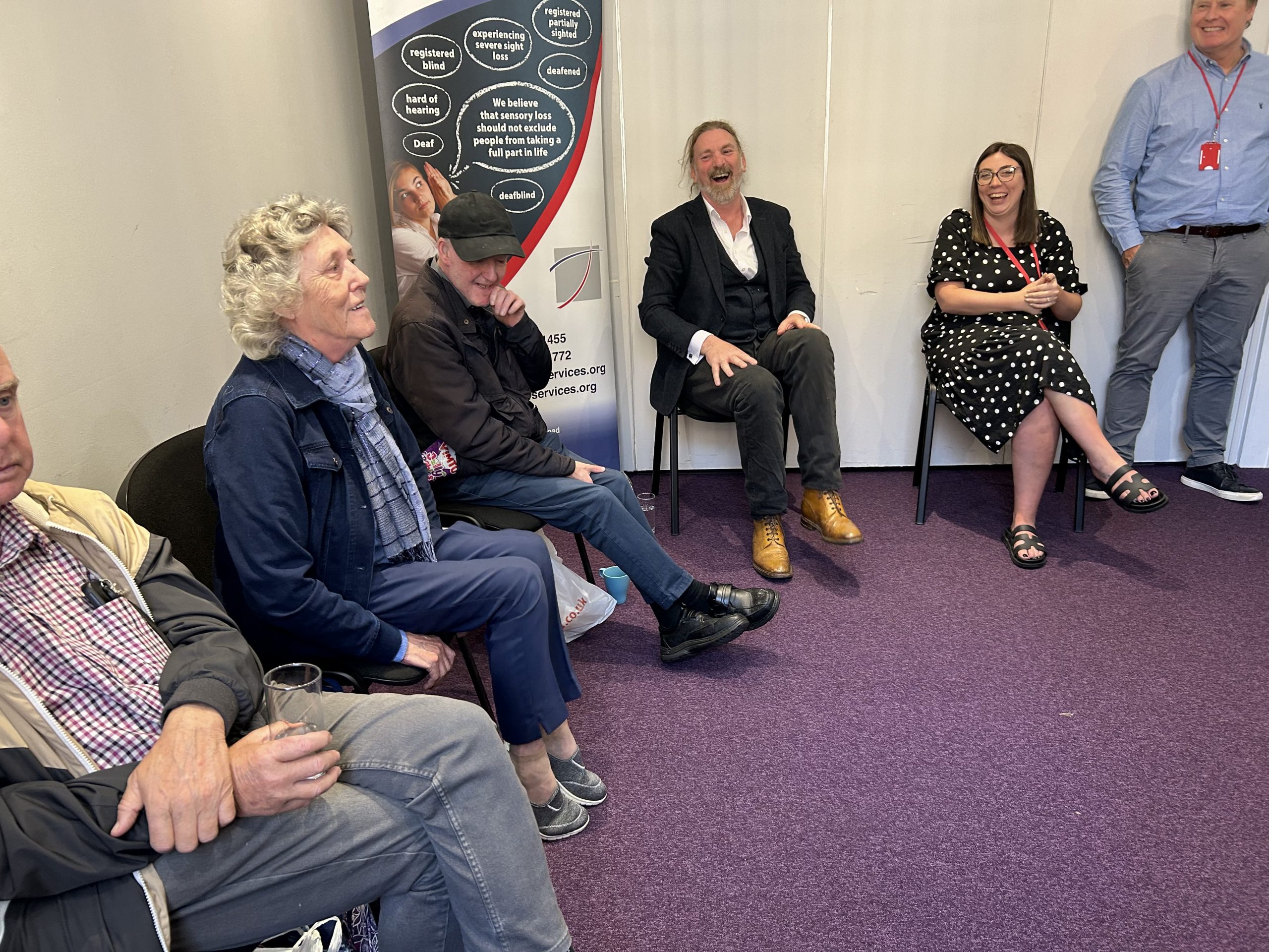 Chris Law MP speaking to NESS service users and staff.