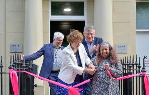 James Adams Sarah Boyack MSP Matt Stringer Kirin Saeed cutting the pink ribbon