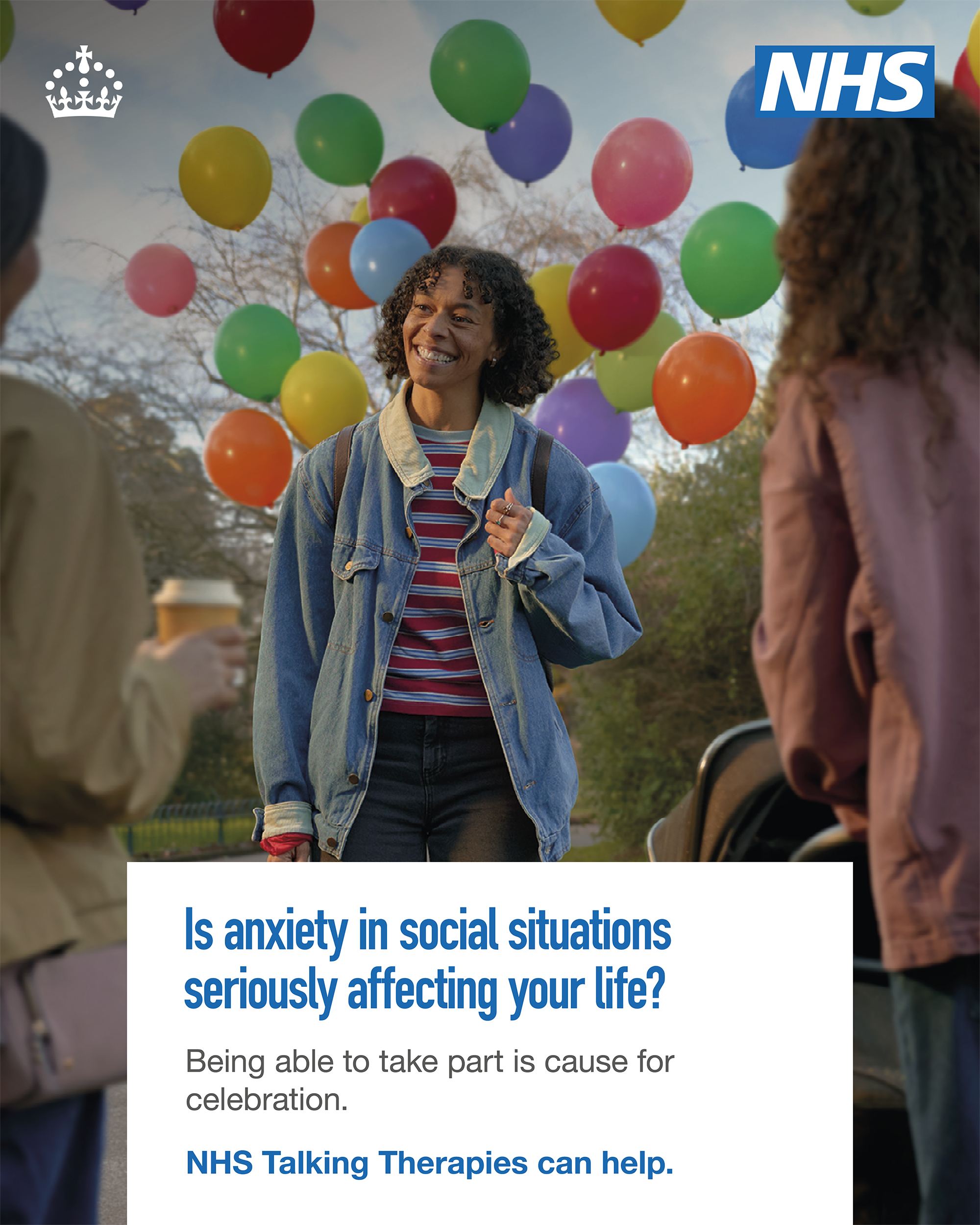 A black woman in a park, is smiling at two other woman. There are trees and colourful balloons floating in the background. Text says "Is anxiety in social situations seriously affecting your life? Being able to take part is cause for celebration. NHS Talking Therapies can help. The NHS logo is in the top right hand corner and a crown logo is in the top left hand corner.