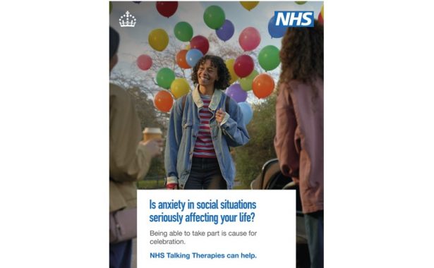 A black woman in a park, is smiling at two other woman. There are trees and colourful balloons floating in the background. Text says "Is anxiety in social situations seriously affecting your life? Being able to take part is cause for celebration. NHS Talking Therapies can help. The NHS logo is in the top right hand corner and a crown logo is in the top left hand corner.