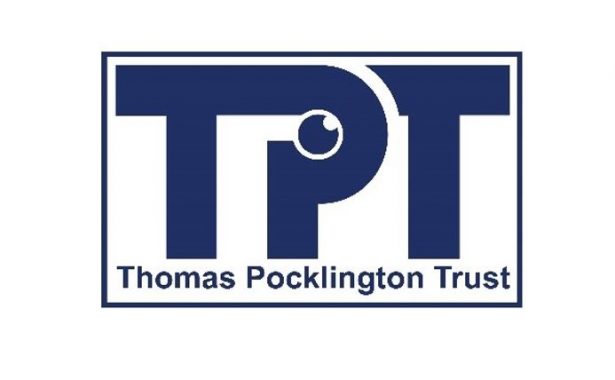 Thomas Pocklington Trust logo. Large TPT letters with the words Thomas Pocklington Trust underneath enclosed in a rectangle. Letters, words and the rectangle border are a dark blue. Within the P of TPT is a small round eye looking upwards.